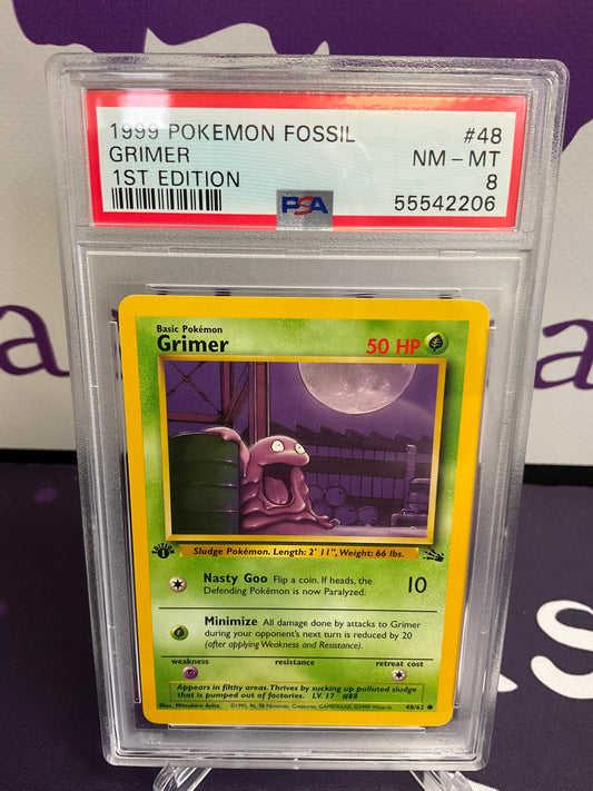 1999 Pokémon Fossil Grimer 1st Edition PSA 8