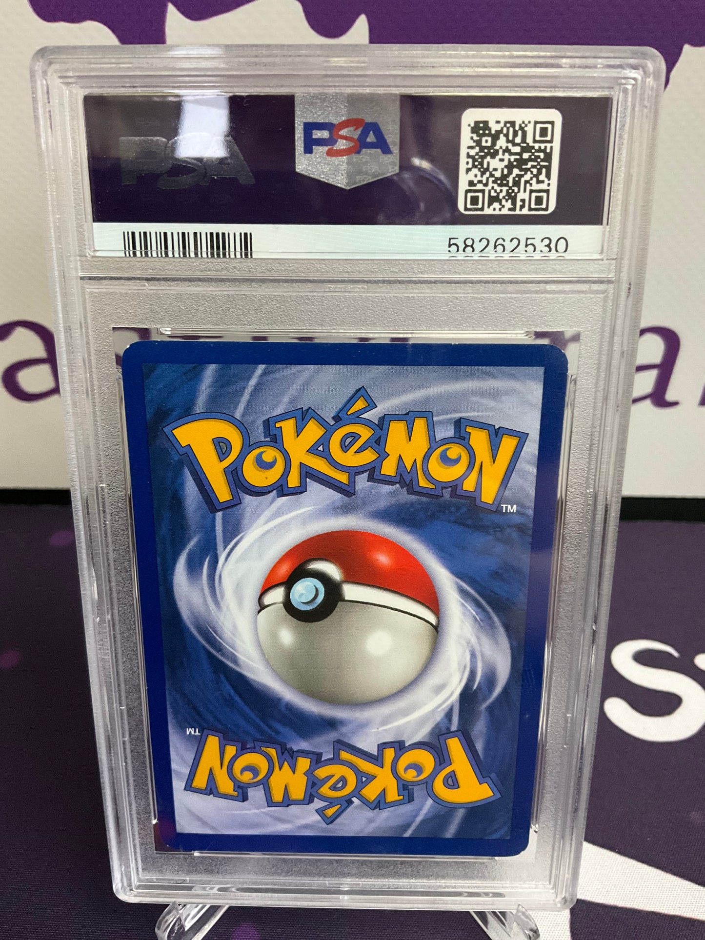 1999 Pokémon Fossil Weezing 1st Edition PSA 8